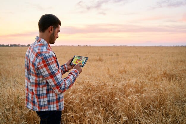 A farmer standing in a field, holding a tablet that displays an AI-generated map of the soil composition with different colors representing nutrient levels. The farmer is smiling and pointing at the tablet, seemingly satisfied with the insights.