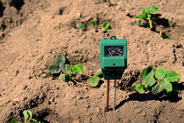 Close-up shot of a soil moisture sensor inserted into the ground in an agricultural field. The sensor is connected to a wireless transmitter. Focus is on the sensor and the surrounding soil, highlighting the technology's integration with the environment.