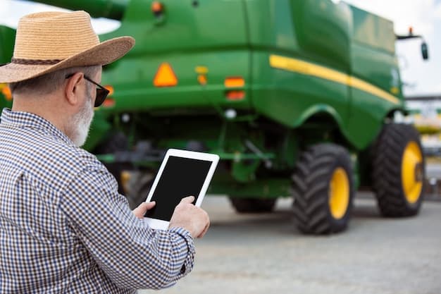 A farmer using a tablet to monitor the operation of an autonomous tractor in a field. The tablet displays real-time data and performance metrics of the tractor, highlighting the farmer's ability to manage the autonomous machinery.