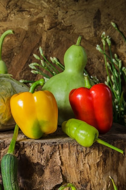 A close-up shot of freshly harvested organic vegetables, including vibrant leafy greens, colorful peppers, and ripe tomatoes. The vegetables are arranged in a wooden basket, showcasing their natural colors and textures, and highlighting their freshness and nutritional value.