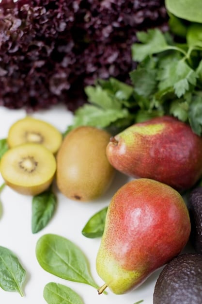 A detailed close-up shot of various fresh fruits and vegetables (e.g., apples, berries, leafy greens) arranged in an appealing display, highlighting their vibrant colors and textures, representing high-quality agricultural produce destined for export.