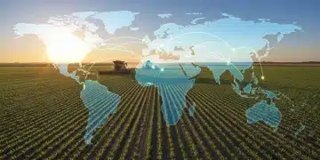 Sunrise over US agricultural fields with global trade overlay